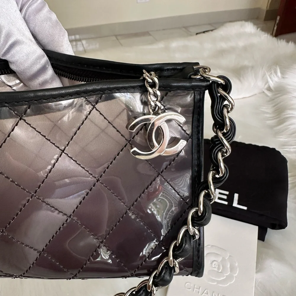 CHANEL Silver Quilted PVC Shoulder Bag with Black Trim